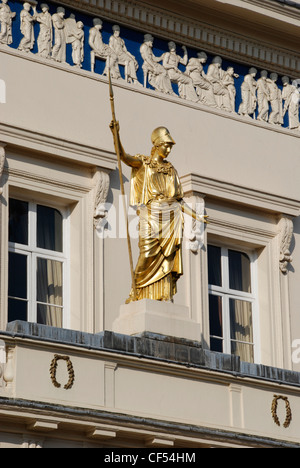 A close up of Athena statue and frieze on the exterior of the Athenaeum Club in London. Stock Photo