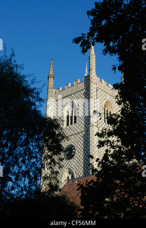 A view through the trees to the Church of St Mary the Virgin in Reading. Stock Photo