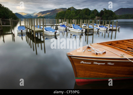 Early morning. Boats at Keswick landing stages, Derwent water, Lake district, Cumbria, England, UK. Stock Photo