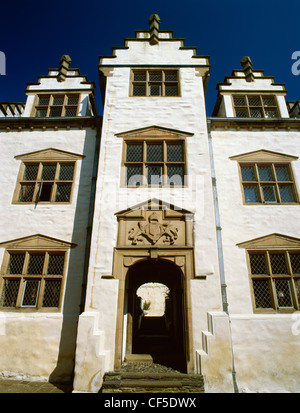 Looking up from High Street at the gatehouse to Plas Mawr (Great Hall), probably the best preserved Elizabethan townhouse in Bri Stock Photo