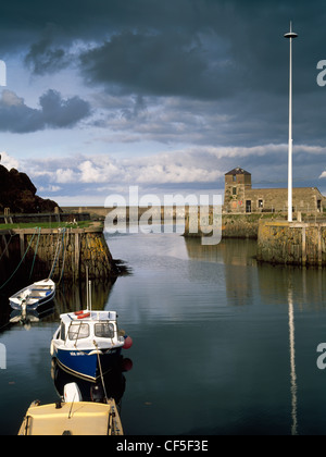 Amlwch Port was the harbour for the Parys Mountain copper mines. The pier on the right, built in 1816, enabled some forty vessel Stock Photo