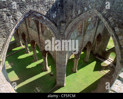 Looking down into the crossing of the ruined Tintern Abbey church with the chancel to the left and the south transept to the rig Stock Photo