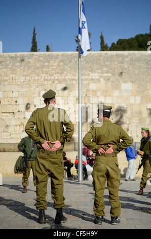 Israeli Soldiers stand at attention near the Western Wall in Jerusalem, Israel. Stock Photo