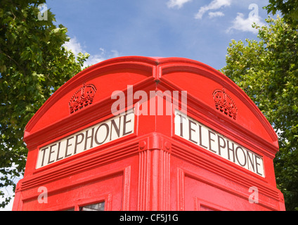 The top of a traditional red telephone box in Notting Hill. Stock Photo