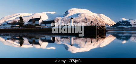 Corpach Lighthouse on Loch Eil with Ben Nevis and Fort William in the background. Stock Photo