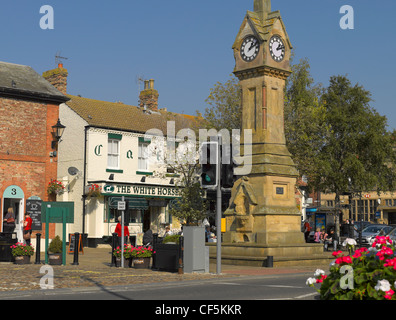 The clock tower in Market Place in the small market town of Thirsk. Stock Photo