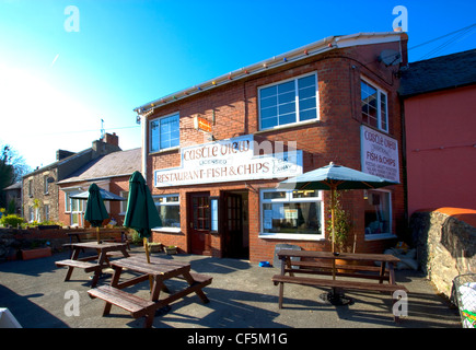 Exterior view of Castle View chip shop in Llaughaune. The record for the most portions of fish and chips served up in the UK in Stock Photo