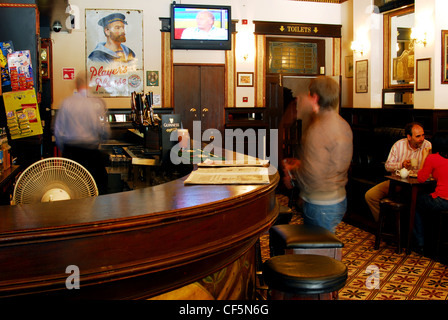 Interior view of drinkers at Bewley's pub in Dublin. Stock Photo