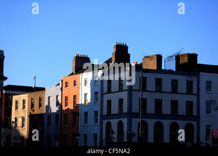 A view to the colourful houses at Eden Quay in Dublin. Stock Photo