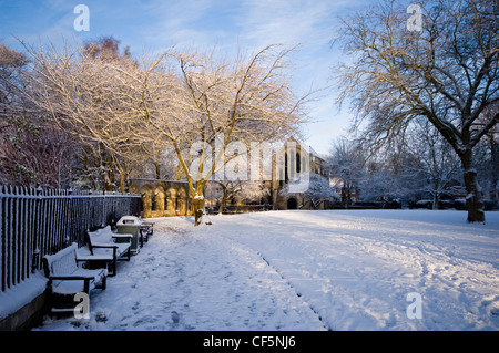 York Minster Library (1230), the largest cathedral library in England, viewed from the snow covered grounds of Deans Park. Stock Photo