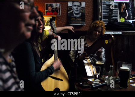 Traditional Irish musicians at the Cobblestone Pub in Dublin. Stock Photo