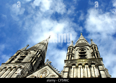 Looking up at St Finbarre's Cathedral in County Cork. Stock Photo