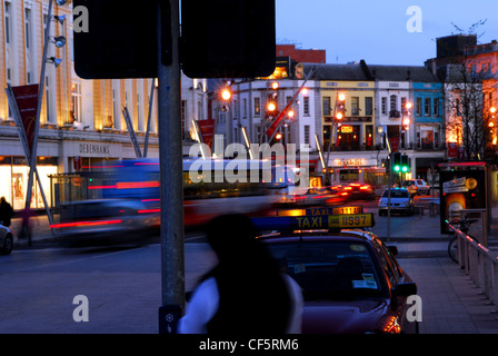A night time view of St Patrick's Street in County Cork. Stock Photo
