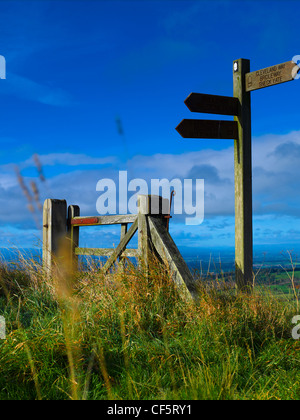 Signpost and gate on the Cleveland Way near Sutton Bank in the North York Moors National Park. Stock Photo