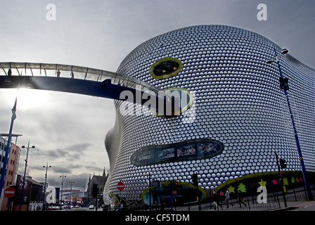 A pedestrian walkway leading into the futuristic Selfridges store in Birmingham's Bullring shopping complex. Stock Photo