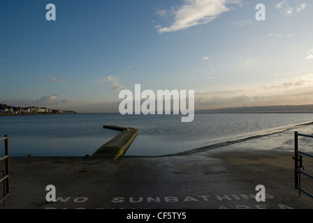 A jetty on West Kirby Marine Lake set on the very tip of the Wirral Peninsula. Stock Photo