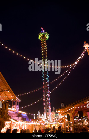 Tower ride and stalls at the Winter Wonderland in Hyde Park. Stock Photo