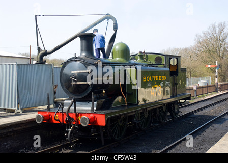 London Brighton & South Coast Railway, Class E4 0-6-2T 473, 'Birch Grove' steam locomotive, taking on water at Sheffield Park St Stock Photo