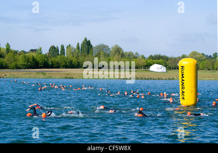 Swimmers rounding a buoy during a Triathlon event at Eton Dorney, the venue for Rowing, Paralympic Rowing and Canoe Sprint event Stock Photo