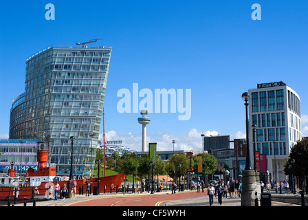 A mixture of old and new landmarks in Liverpool featuring the former Mersey Bar Lightship 'Planet' in Canning Dock, One Park Wes Stock Photo