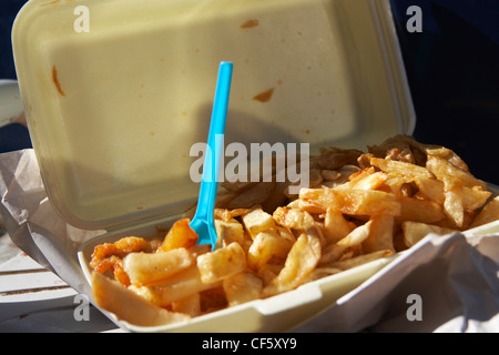 A close up of fish and chips in a tray on Morecambe sea front. Stock Photo