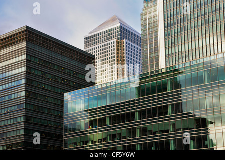 Glass clad office buildings at the Canary Wharf office and shopping development, home the the three tallest buildings in the UK. Stock Photo