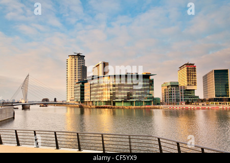 View across Salford Quays to the new MediaCityUK development on Pier 9. The BBC are due to complete the move of five departments