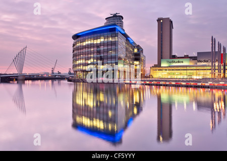 View across Salford Quays to the new MediaCityUK development on Pier 9. The BBC are due to complete the move of five departments Stock Photo