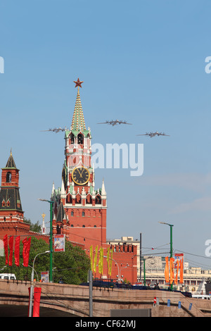MOSCOW MAY 9 3 Tu-95ms large four-engine turboprop powered strategic bomber missile platform airplanes fly over Red Square Stock Photo