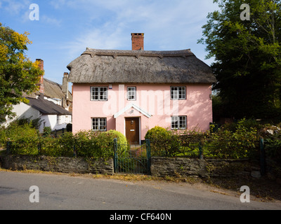 Pretty thatched cottage in Winsford. Stock Photo