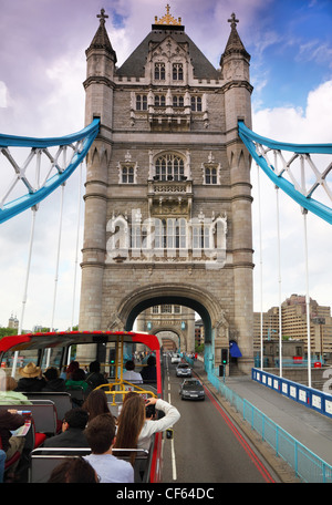 In bus on Tower Bridge in London. Tower Bridge is one of most recognizable bridges in world. Stock Photo
