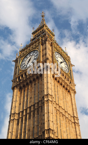 Big Ben is famous English clock chimes in Gothic style in London. Big Ben is one of London's best-known landmarks Stock Photo