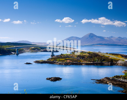 The Skye Bridge connecting Kyle of Lochalsh on the Scottish mainland to Kyleakin on the Isle of Skye. The Red Cuillin can be see Stock Photo