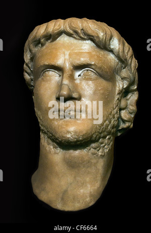 Roman portrait bust of the Emperor Gallienus (reign 253–268 AD) featuring a short beard, mustache, and stylized hair curls, Stock Photo