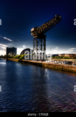 A view across the River Clyde toward the Finnieston Crane in Glasgow. Stock Photo