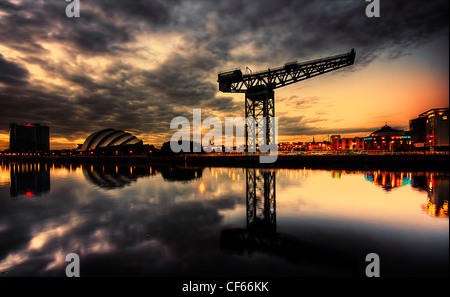 A view across the River Clyde toward the Finnieston Crane in Glasgow. Stock Photo