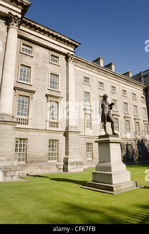 Oliver Goldsmith (1728-1774) statue outside Trinity College. The writer of the play 'She Stoops to Conquer' was born in Co Longf Stock Photo