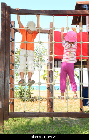 Children on a rope climbing net Stock Photo - Alamy