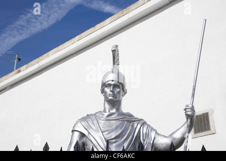 A silver plastic Roman figure at the Barry Island Pleasure Beach in Glamorgan. Stock Photo