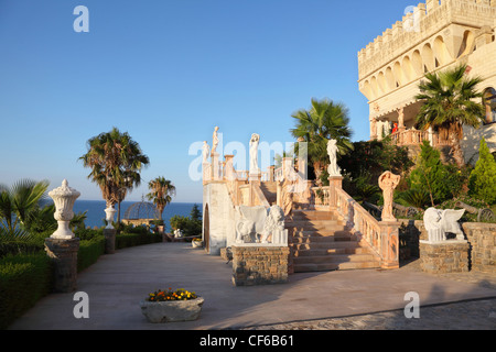 Wide stair is decorated statues goddesses zoons anchorwoman palace woman which stands at entrance verandah looks at seaside Stock Photo