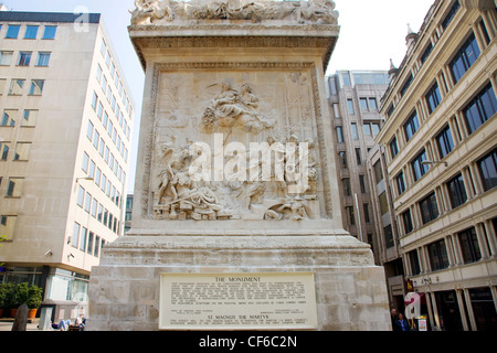 A close up of the base of the Monument to the Great Fire of London in the City of London. Stock Photo