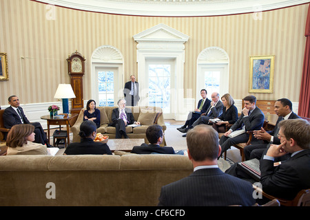 President Barack Obama meets with senior advisors in the Oval Office March 1, 2011 in Washington, DC. Stock Photo