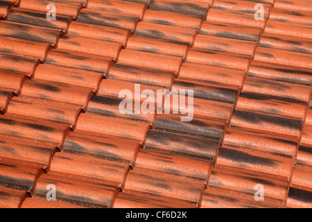 Old terracotta tile roof, detailed structure view at an angle the tiles Stock Photo