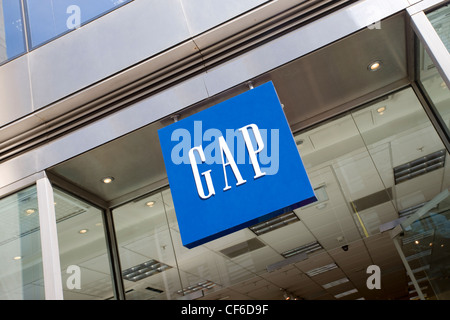 A GAP sign hanging outside one of their stores in the City of London. Stock Photo