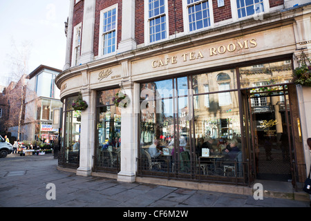 York City, Yorkshire, England the famous Bettys cafe tea rooms looking in from outside at people enjoying tea & coffee lunch Stock Photo