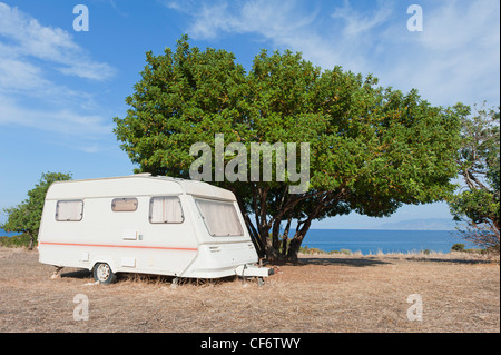 Caravan on camping by the sea Stock Photo