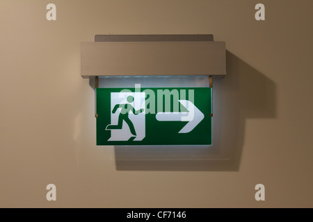 An emergency exit sign in a public building in Vienna Stock Photo