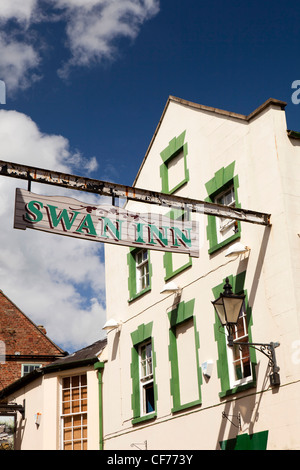 UK, Gloucestershire, Stroud, Swan Lane, Swan Inn’s sign over the road Stock Photo
