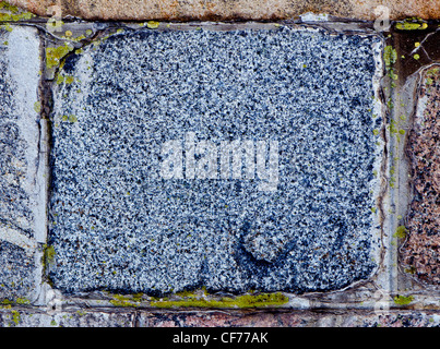 Ancient granite brick background closeup details. Stock Photo