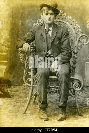 1900s MAN WEARING BOWLER HAT TYPING IN OFFICE Stock Photo - Alamy